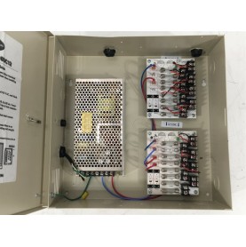 This UL listed wall mount power supply is housed in a metal cabinet. It has sixteen (16) individually fused outputs and a status LED.